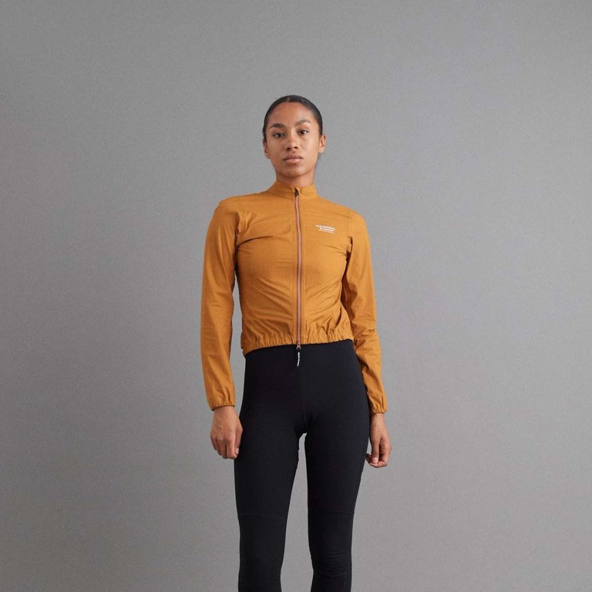 Pas Normal Studios - Women's Mechanism Pertex Rain Jacket - Burned Orange